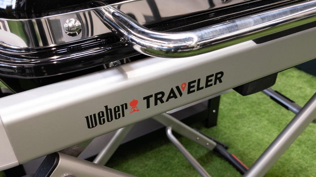 Weber traveler logo sign and brand text on gas grill