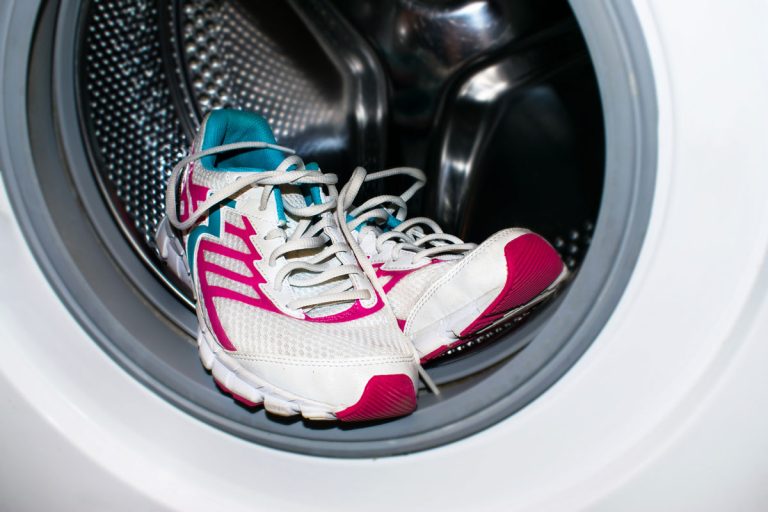 White and pink sneakers wash in the washer, Can You Put Shoes In The Washer And Dryer [Best Practices]
