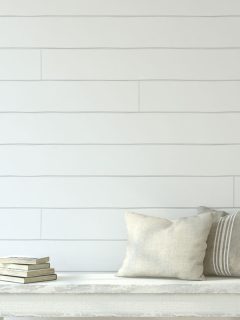 Wooden bench near white shiplap wall, Can You Put Shiplap Over Tile