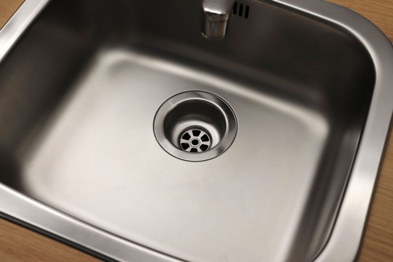 a clean stainless silver sink, Kitchen Sink Won't Drain But Isn't Clogged - What's Wrong?