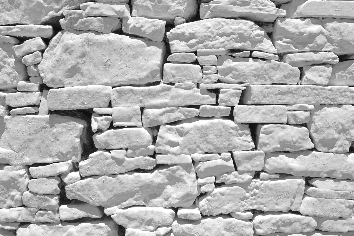 surface of vintage stone wall at old house