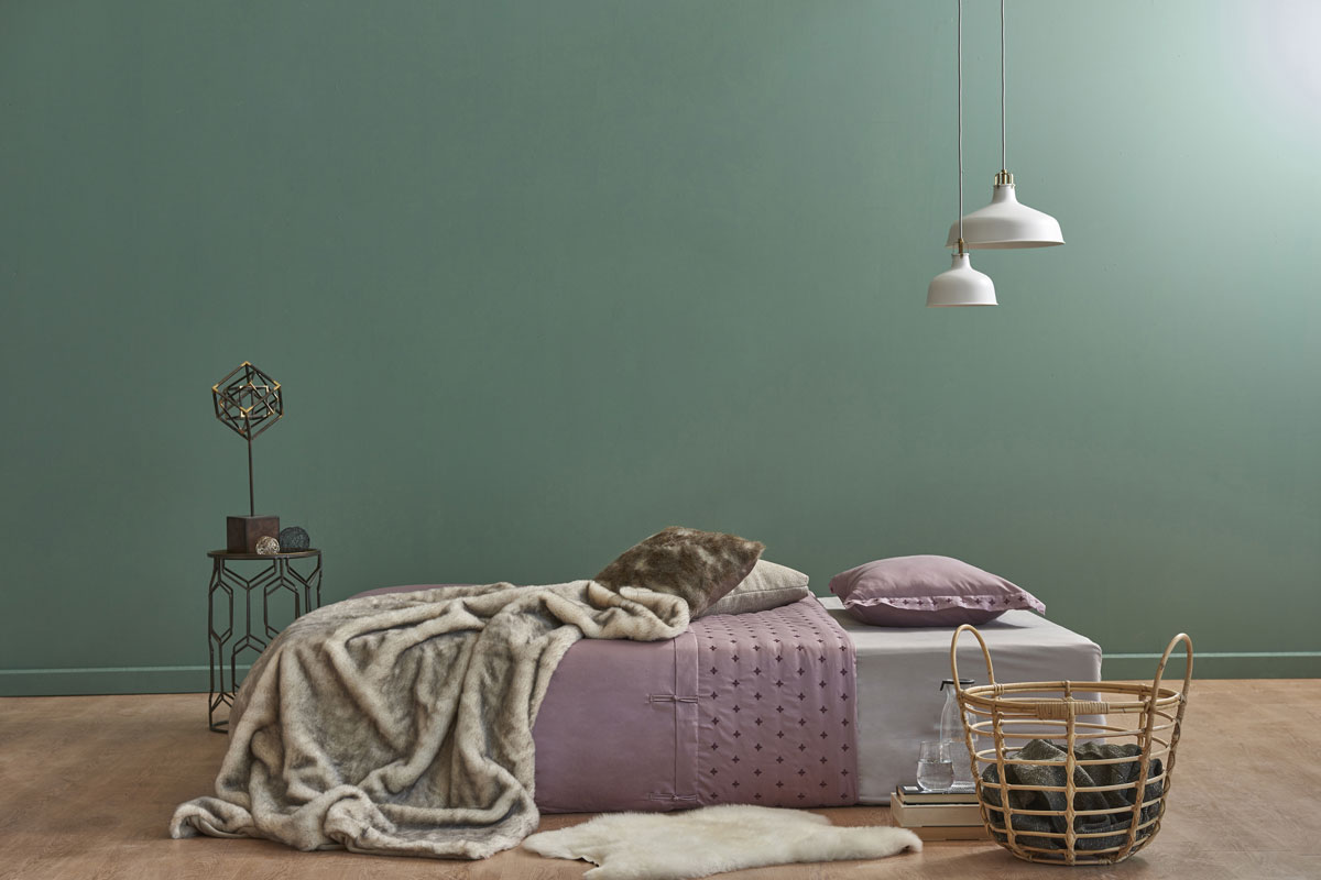 wide bedroom new interior style with frame behind green wall decor