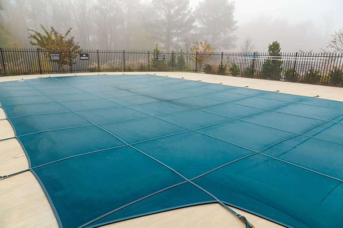A Blue Vinyl Pool Covered