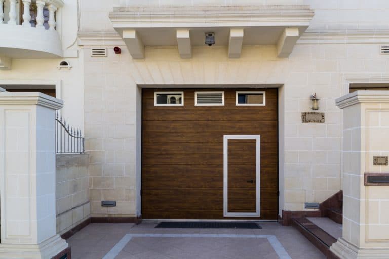 A brown door with limestone exterior, What Colors Go With A Limestone Exterior?