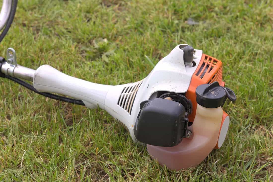 A Stihl weed eater photographed in the garden