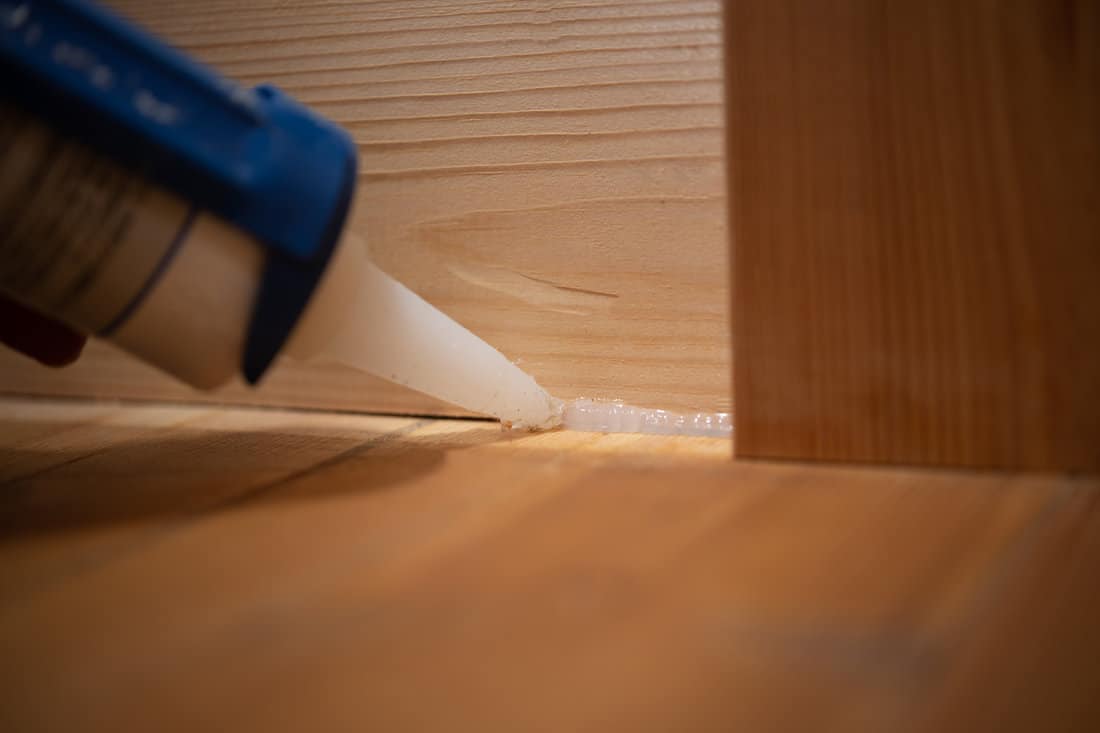 Applying Silicone Caulking Between Wood Floor and Wall