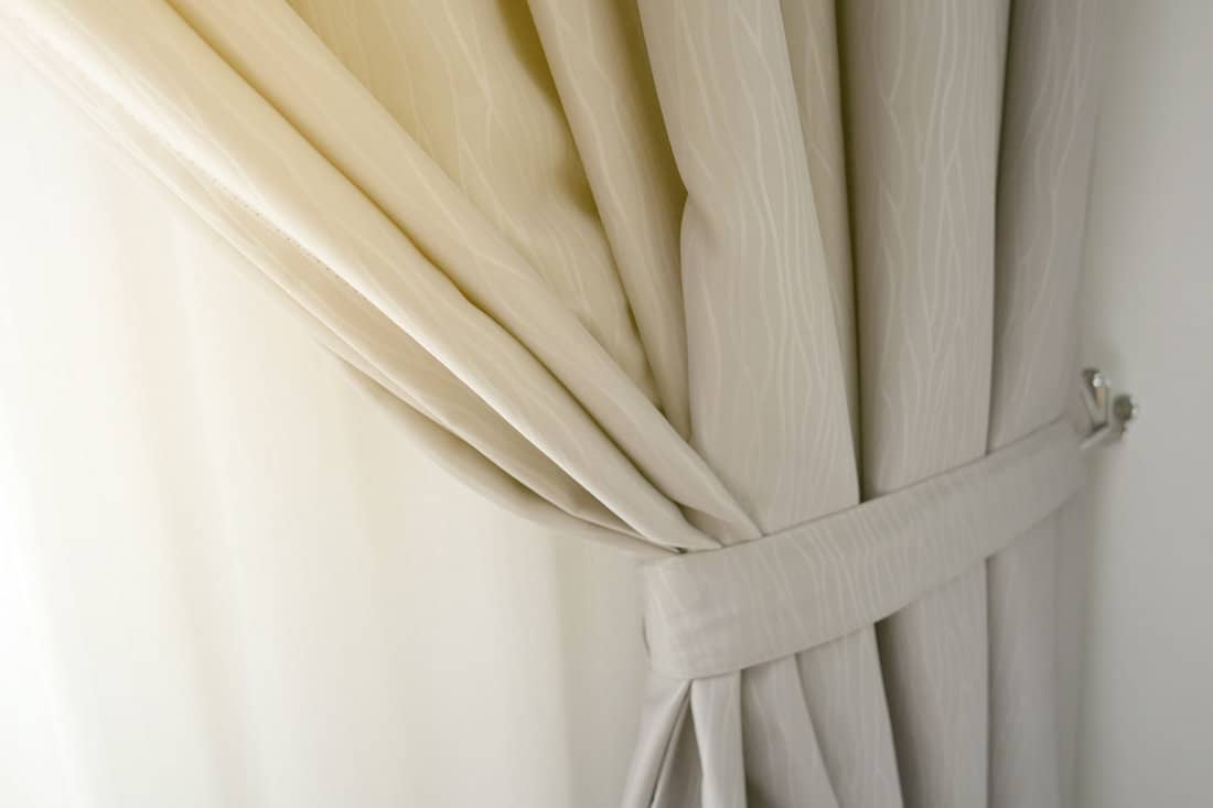 Close up view of a window curtain.
