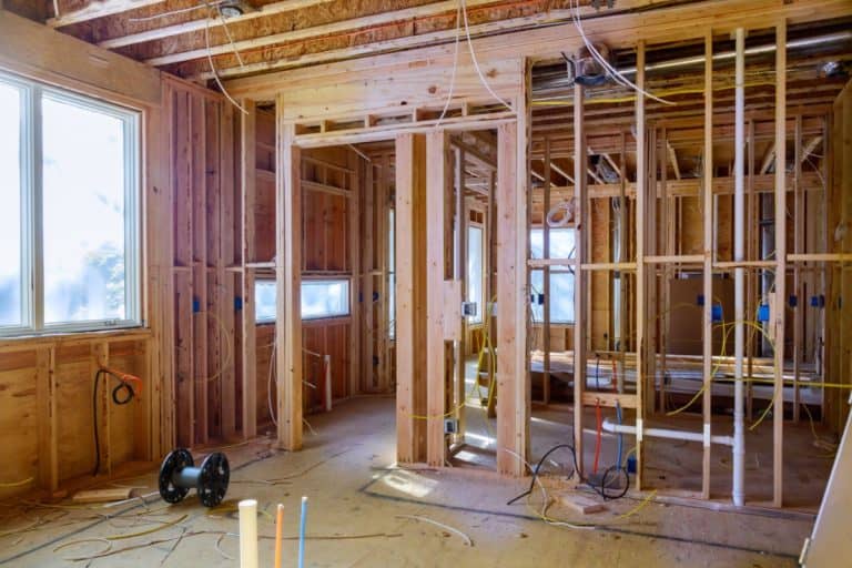 Construction home interior inside a framing on residential beam framework wooden new house - How Far Apart Should Wall Studs Be ?