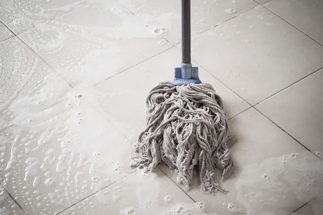 Floor cleaning with mob and cleanser foam