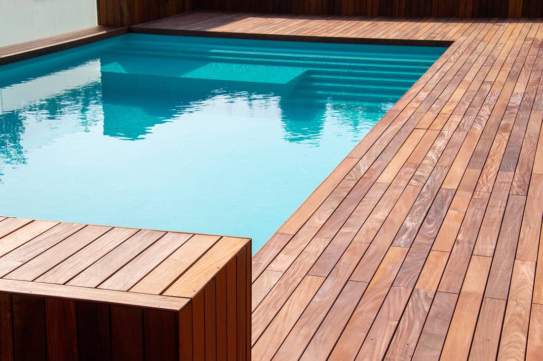 Hardwood ipe pool deck on direct sun heat