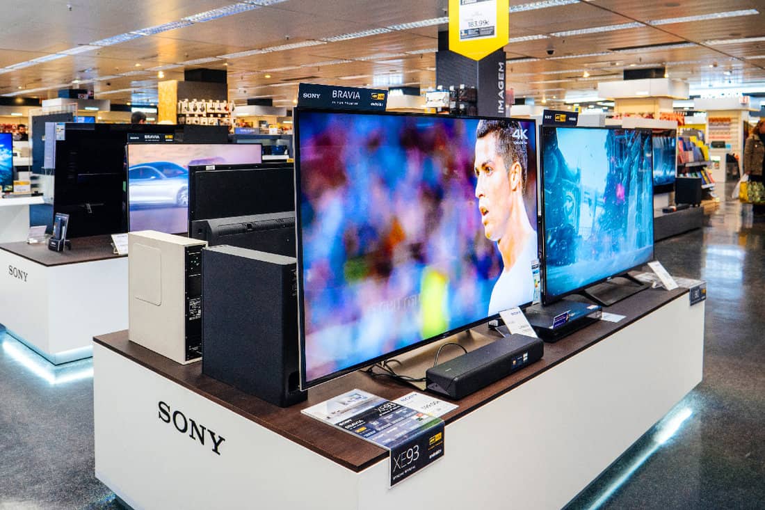Large selection of Sony Bravia UHD QLED display for sale in retail shopping center