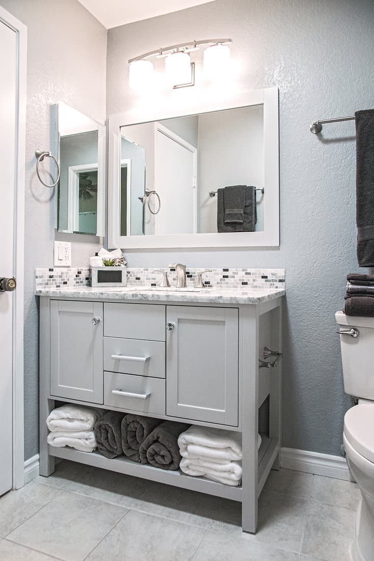 Modern bathroom with gray vanity