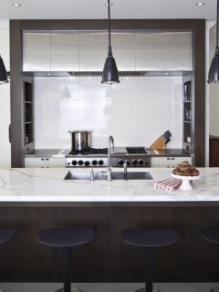 Modern, sleek kitchen in neutral palette. How Far Apart Should Island Pendant Lights Be.