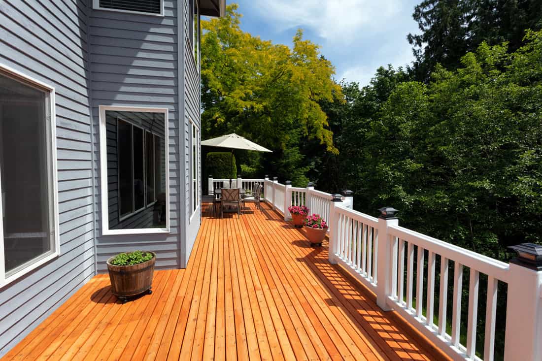 New red cedar outdoor wooden deck during nice weather in horizontal layout
