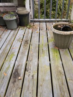 An old rusty wooden deck of a house, How To Repair And Smooth A Splintered Wood Deck