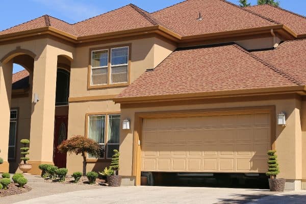An open garage door in suburban family home, Where Is My Doorbell Transformer? Here's How To Find It