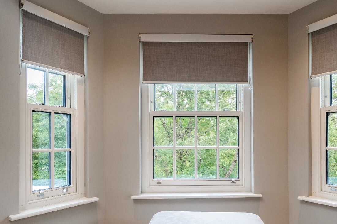 Pretty windows with blinds in a house