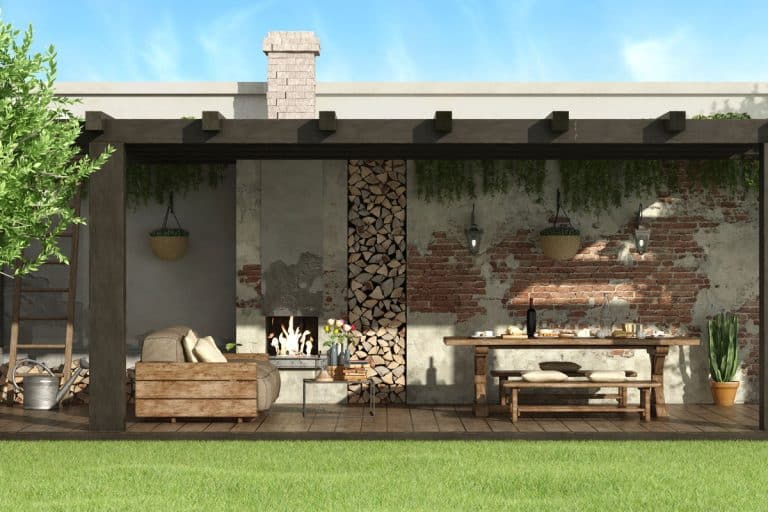 Rustic pergola in a garden with dining table, barbecue and sofa outdoor, 21 Great Outdoor Wall Decoration Ideas