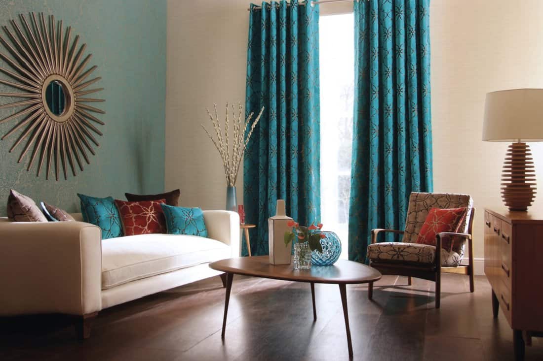 Teal - Contemporary lounge living room with sofa, curtains, table and vases