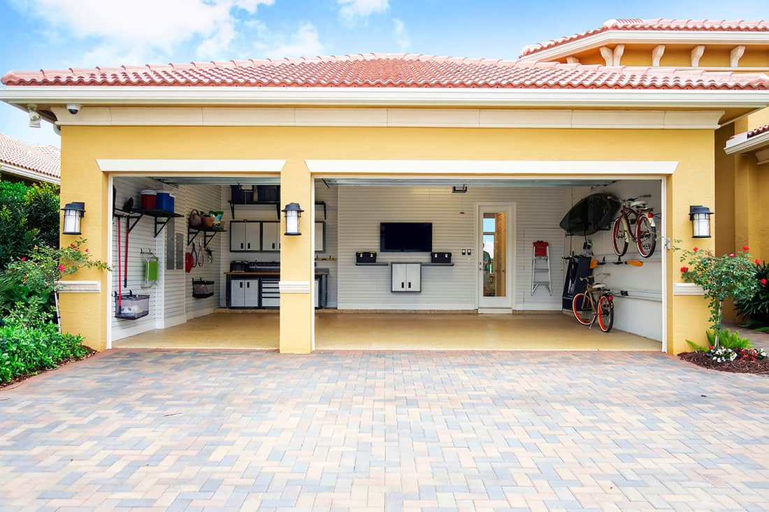 Three car garage attached to a home in a residential community