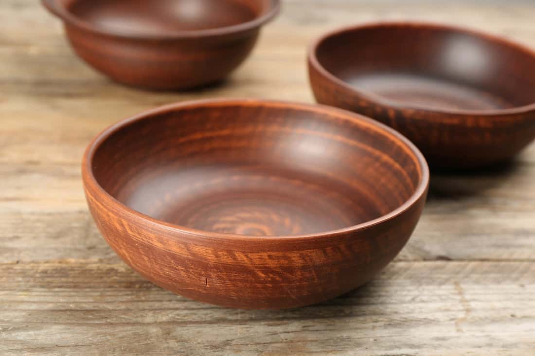 Three handcrafted wooden bowls