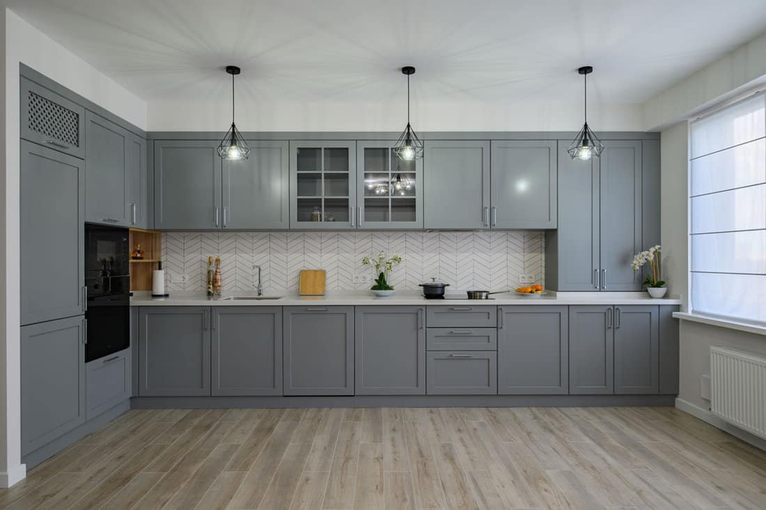 Trendy grey and white modern kitchen furniture showcase