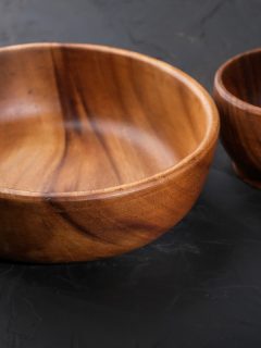 Two wooden bowls on the table, How To Remove Scratches From Nambe Items