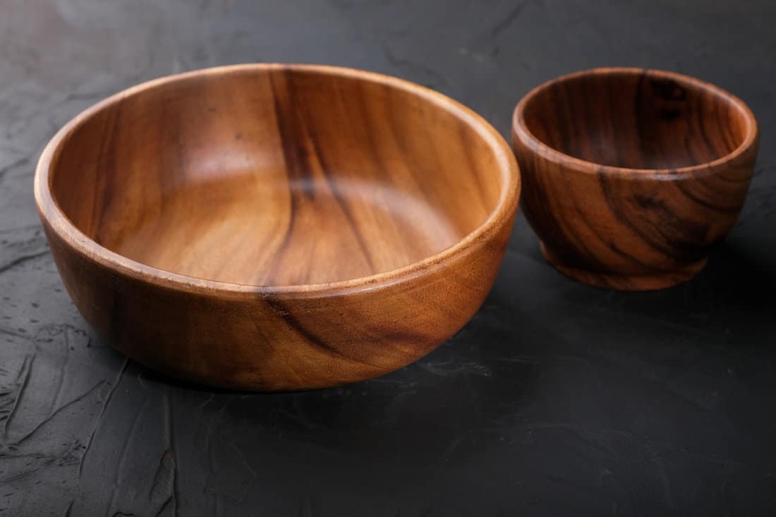 Two wooden bowls on the table