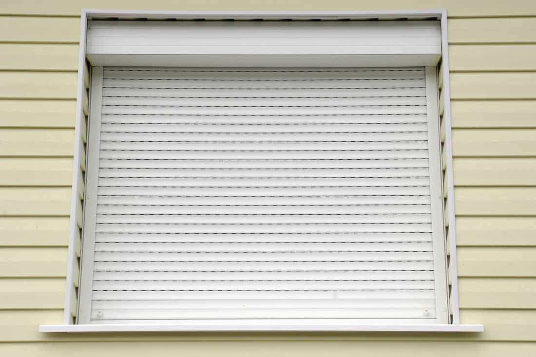 Window with white external blinds house — Photo