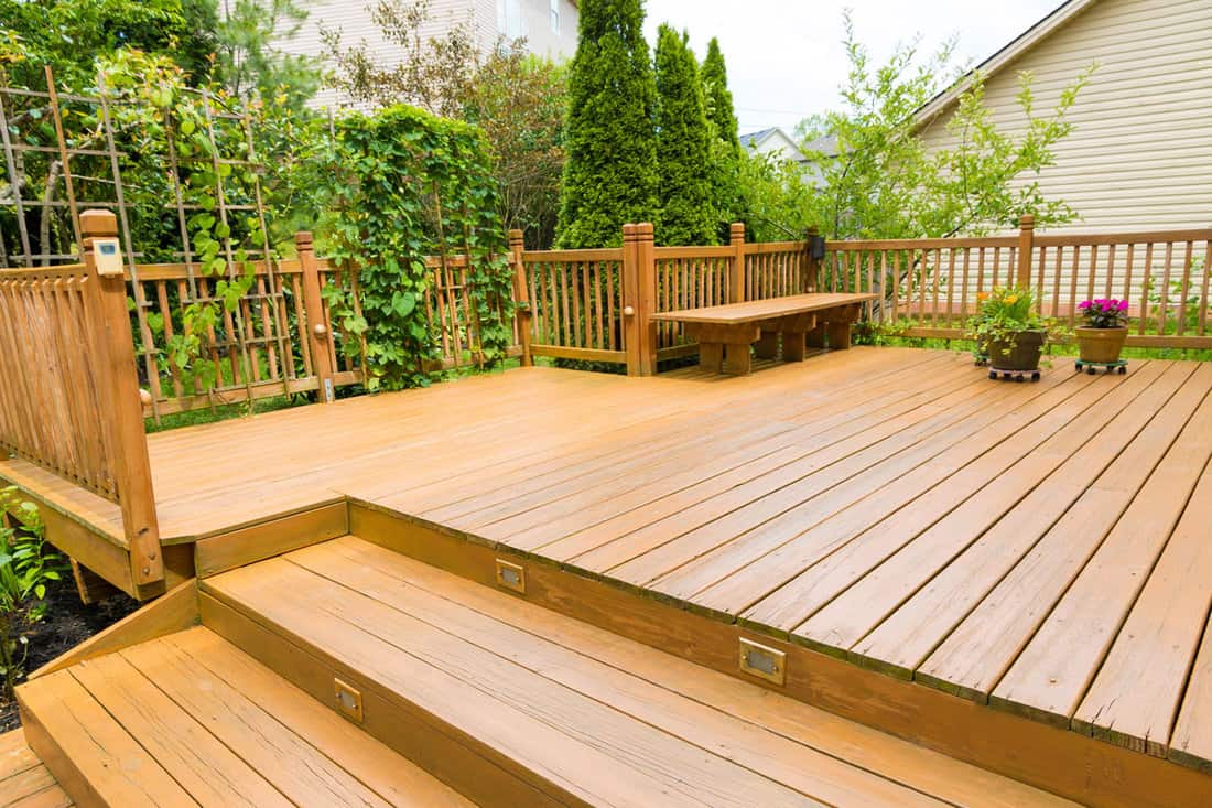 all new wooden deck on the patio, new condition of woods, fresh cut, for outdoor use
