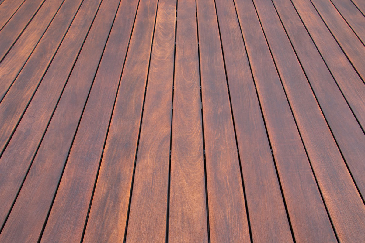 close up photo of a wood deck outside the house