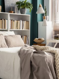 small space in a stylish bedroom interior with designer decor and cozy white and beige bedding, How To Get Static Out Of Blankets