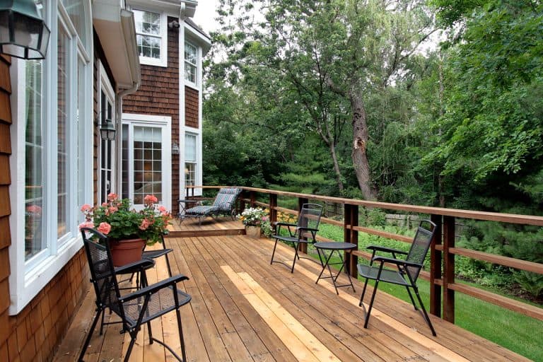 Large wood deck with forest in luxury home, Why Is My Deck Sticky And Tacky?