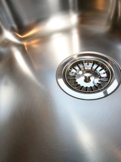 stainless sink photo on the kitchen, minor scratches on it, swirls on the surface, 5 Best Scratch Removers For Stainless Steel Sink