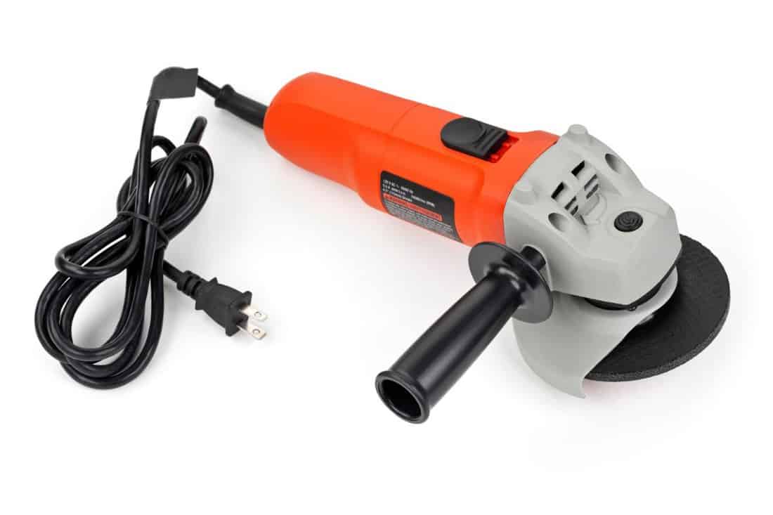 Angle grinder for grinding metal, isolated on a white background.
