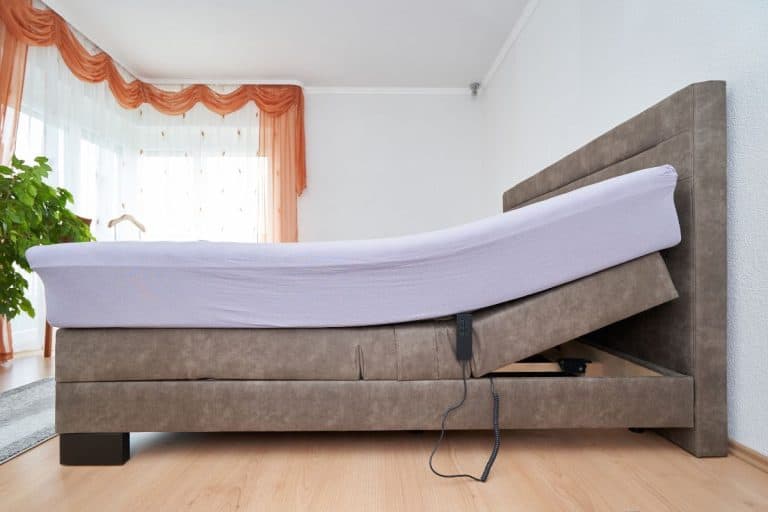 Bed with tilt adjustment mattress bed in the bedroom of the house, comfortable mattress and sleep. - Mattress Sliding On An Adjustable Bed - How To Stop It?