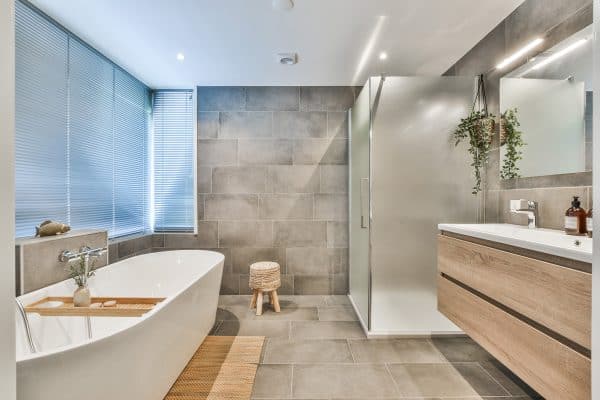 Bright elegant bathroom interior in a luxury house, Which Direction To Lay Vinyl Plank Flooring In A Bathroom
