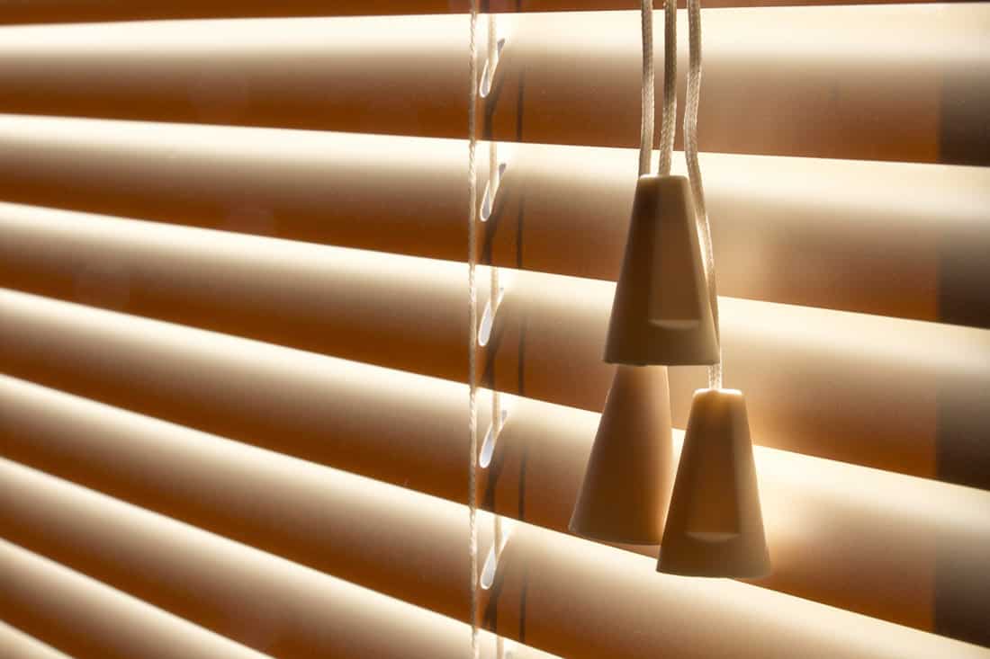 Brown blinds and brown pull strings