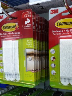 Command brand Picture Hanging Strips and Hooks by 3M company on store shelf. 3M is the general public primarily known for the Post-it Notes and Scotch Tapes., Can You Reuse Command Strips?