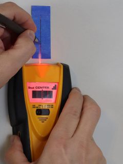 An electronic stud finder to search wall for studs, How To Use A Zircon Stud Finder [Step By Step Guide]