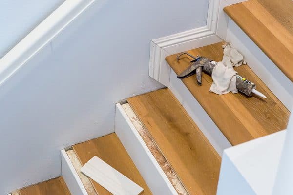 A hardwood floor installation on stairs, How To Install Hardwood Flooring On Stairs With Nosing?