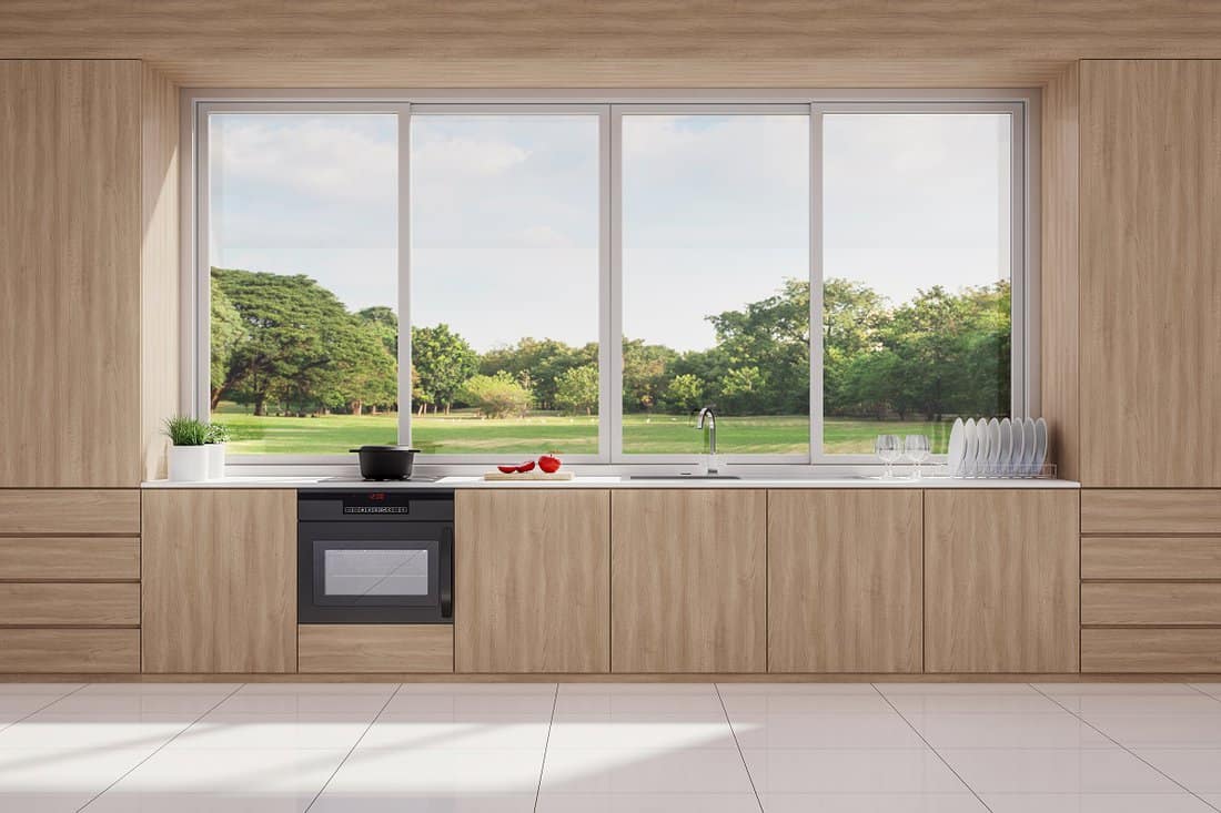 Install a window for additional ventilation - Modern style wooden kitchen with nature view