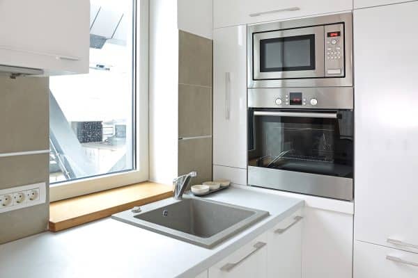 Modern Appliances in Small White Kitchen, Where To Put A Microwave In A Tiny Kitchen?