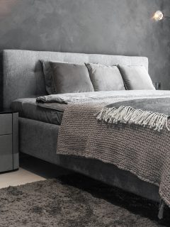 A modern room with trendy gray interiors, What Color Nightstand Goes With Grey Bed? [7 Color Combinations To Try!]