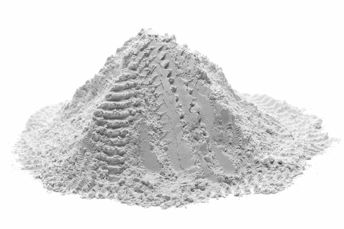 Pile of plaster powder isolated on white background
