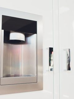 Refrigerator Ice and Water Dispenser modern front design close-up. — Photo