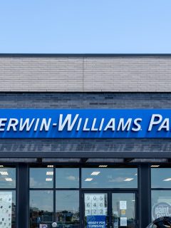 A Sherwin-Williams Paint Store is shown. Sherwin-Williams is an American company that produces paint.
