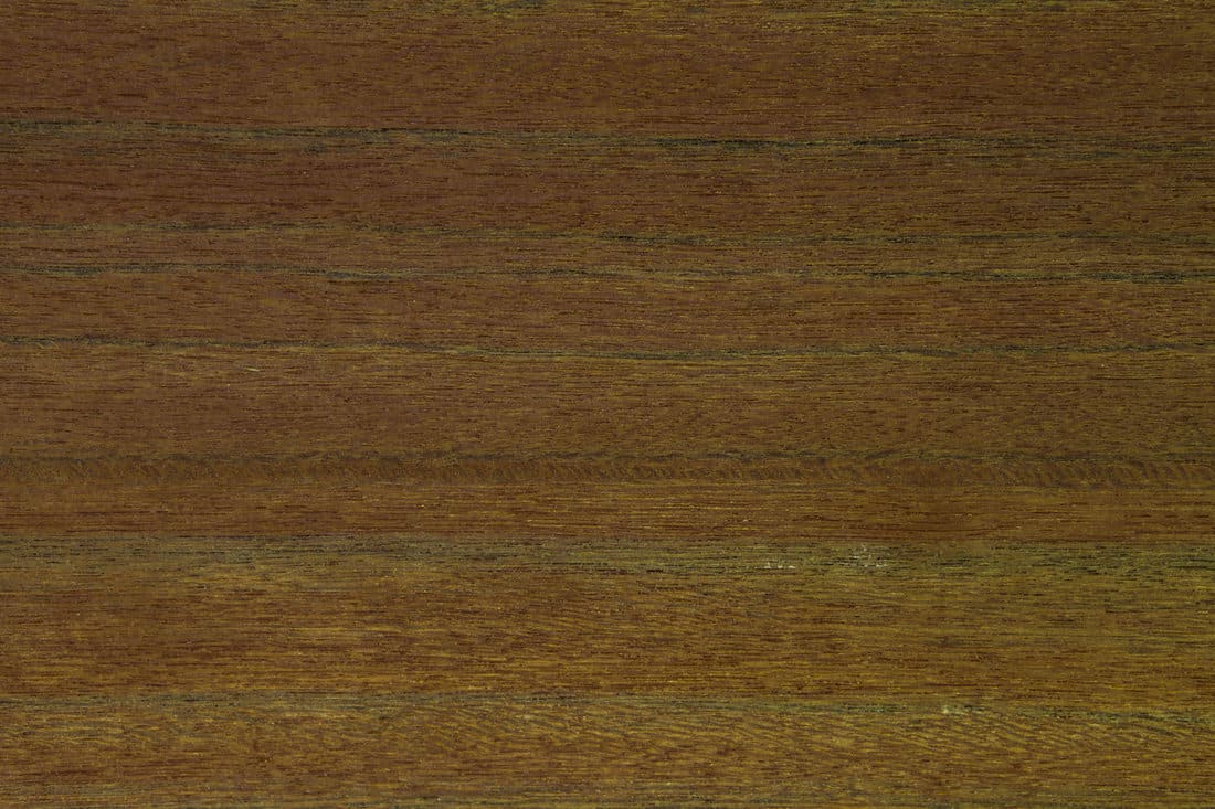 The chopped surface is made of tigerwood (tiger tree). Backdrop or background wooden.