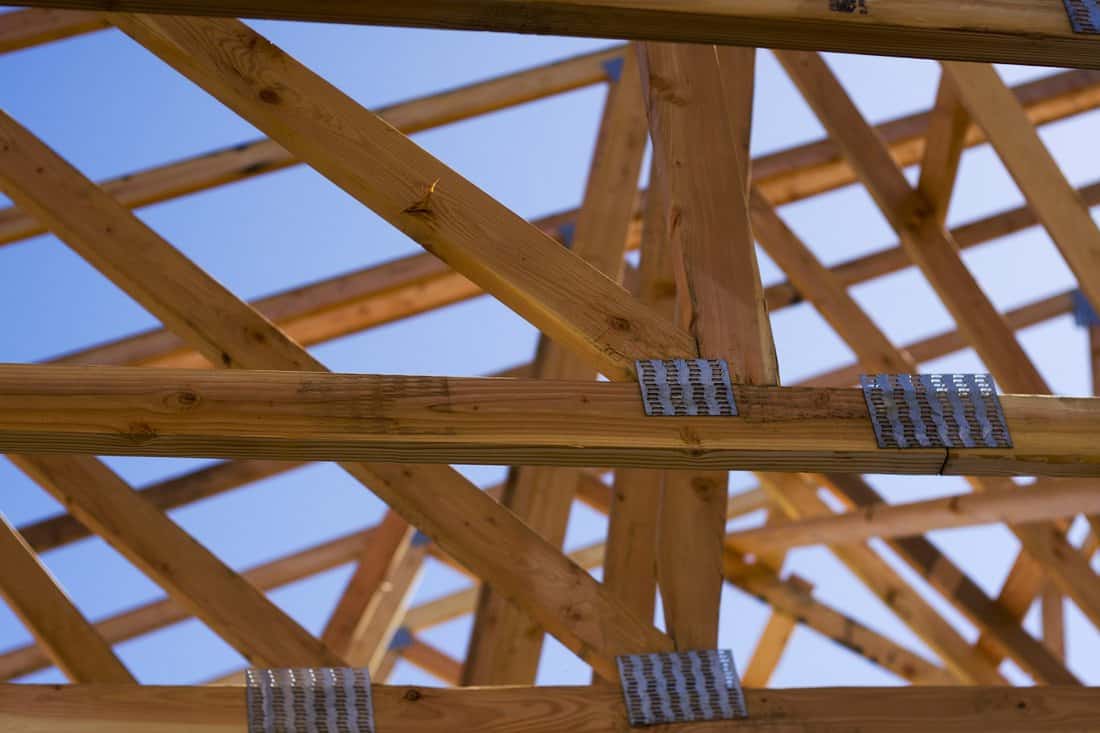What is a roof truss - trusses just placed atop a house under construction.