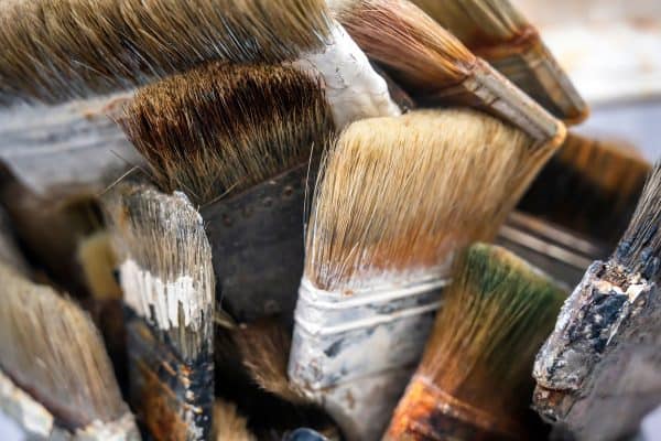 Working set of paint brushes from natural bristles with layering of paint from reusable use, Can You Reuse Paint Supplies? [Inc. Rollers, Brushes, & Trays]